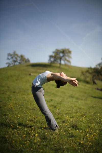 Backbending at my parents ranch in California, photo by Rod Maclean